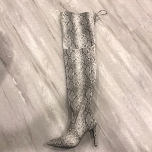 Snakeskin over the knee boots